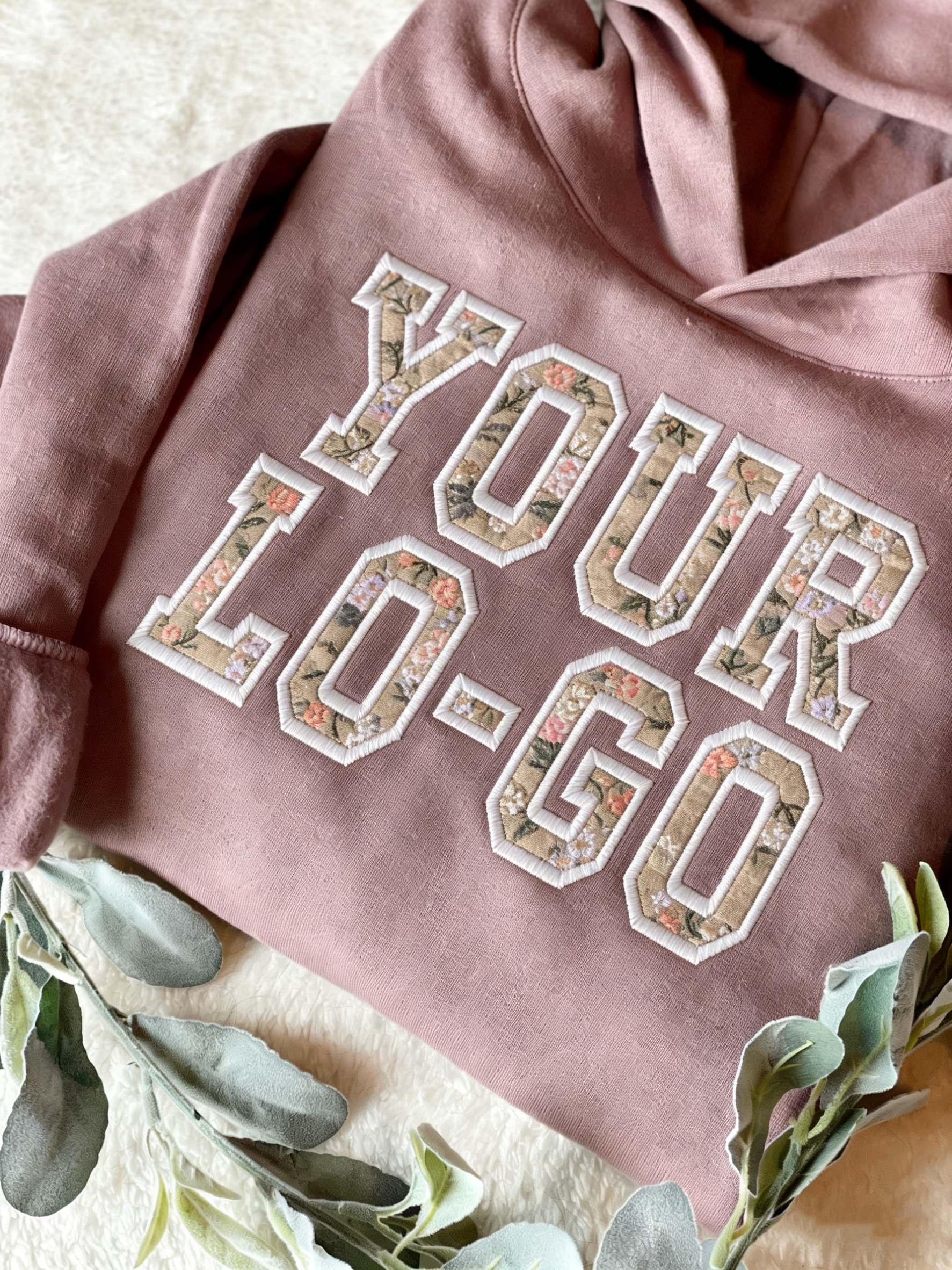 Which color fabrics make appliqué embroidery details stand out most?}